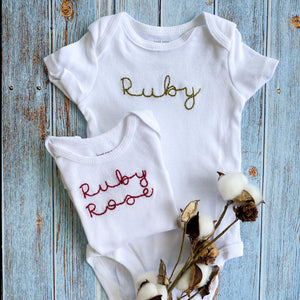 Hand Embroidered Onesie - Centered Name