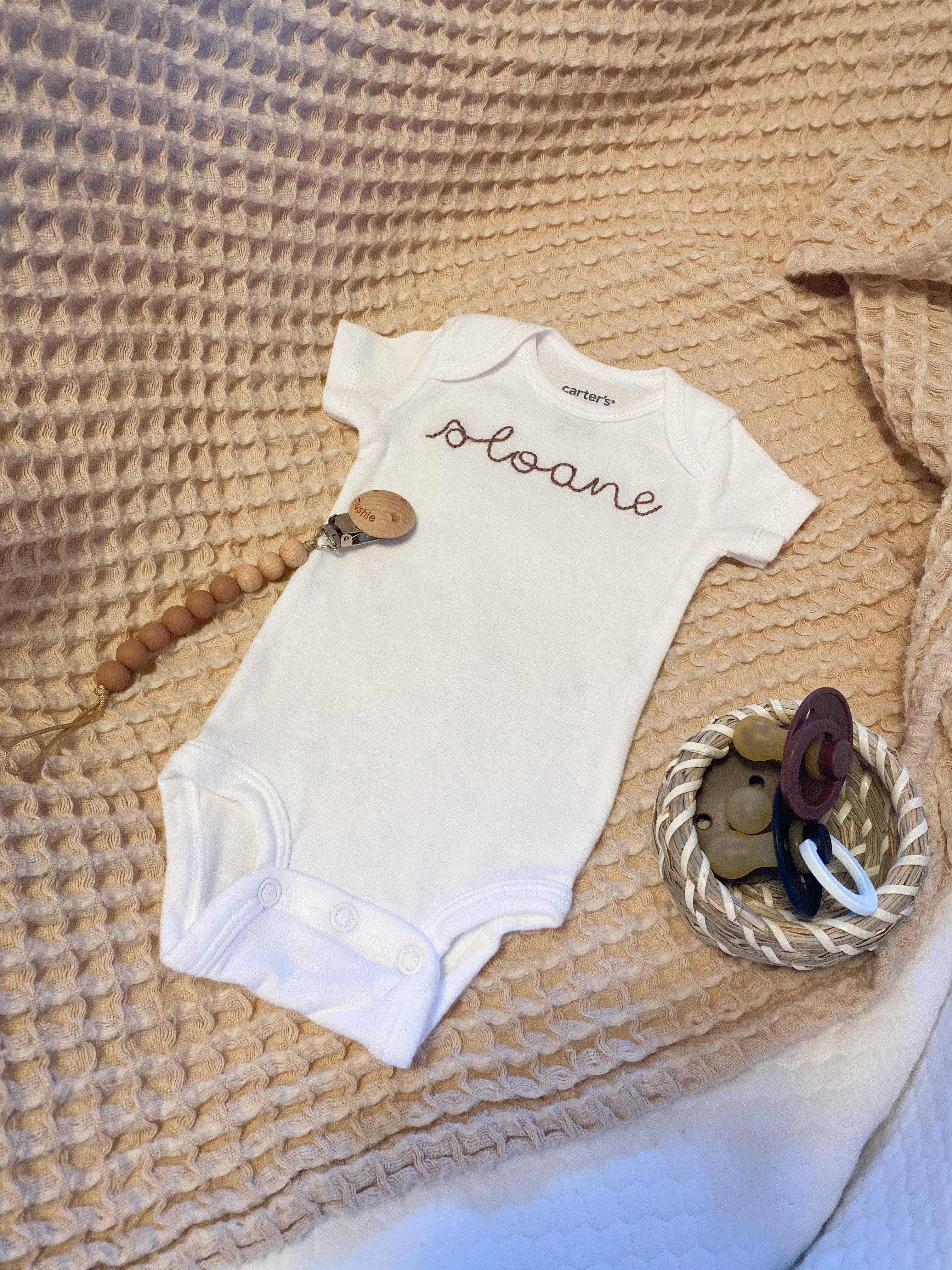 Hand Embroidered Onesie - Centered Name