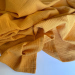 Load image into Gallery viewer, Goldenrod Muslin Swaddle Blanket
